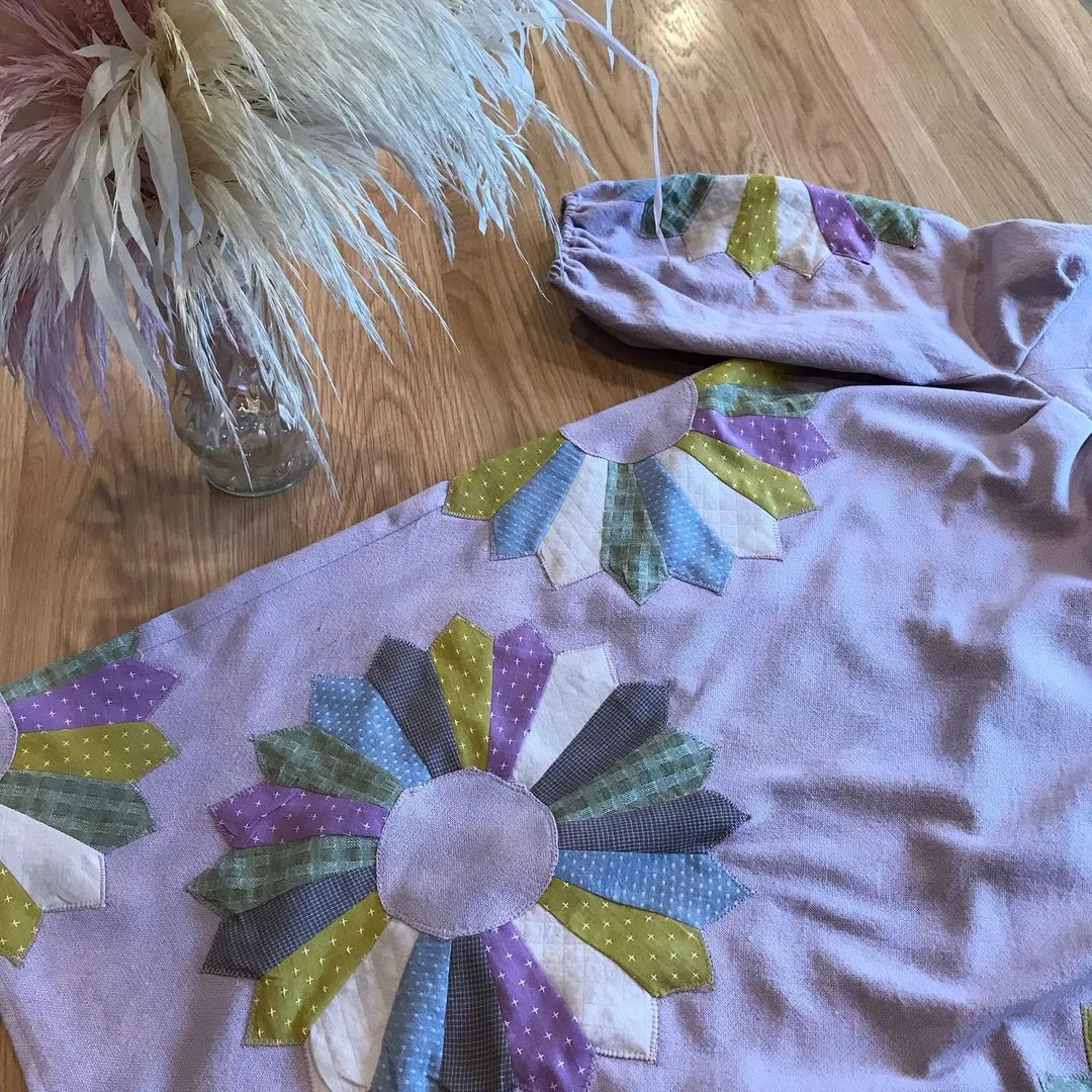 "Finally finished my #s8926 dress appliquéd with Dresden Plates made from @diamondtextiles! I’m super 😍 with my take on the Sea Paloma dress! Here’s a sneak peek before I give it a final press!"